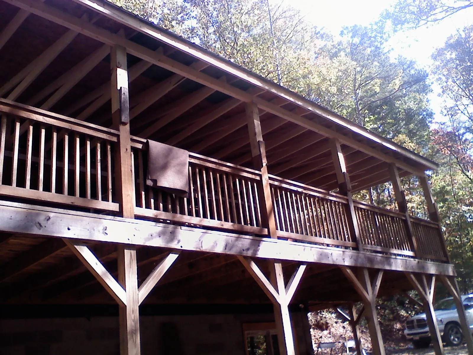 Timber framing under a new elevated porch and deck — Roof Leak Repair in La Valle by Roofing Brothers